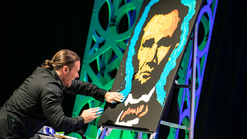 Artist Erik Wahl painting at NAILBA 2016