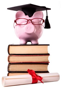 A piggy bank wearing a graduate's cap, with books and a diploma.