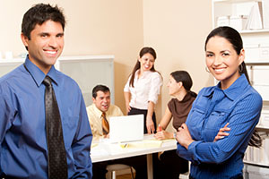 Happy businesspeople in an office.